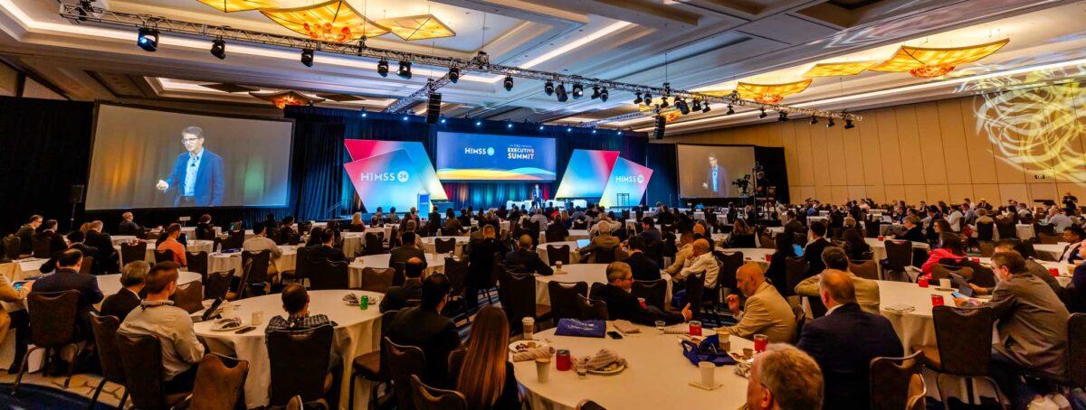 Healthcare executives engaging in a leadership session at the HIMSS25 Executive Summit.