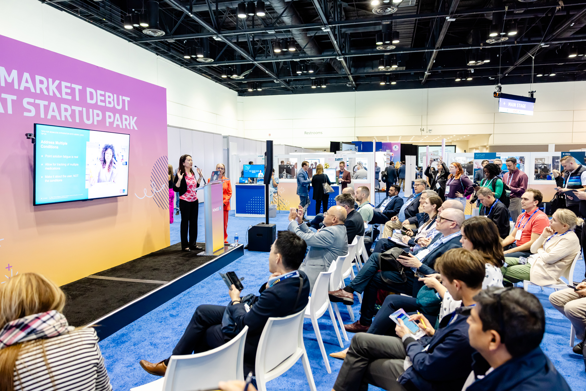 Attendees engaging with startups and exploring innovative healthcare technologies at HIMSS25 Startup Park.
